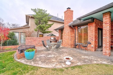 Lovely one level garden home with a view of the 12th fairway at on Oak Tree National Golf and Country Club in Oklahoma - for sale on GolfHomes.com, golf home, golf lot