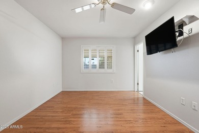 Move-in ready and freshly painted in November, this charming on PalmBrook Country Club in Arizona - for sale on GolfHomes.com, golf home, golf lot