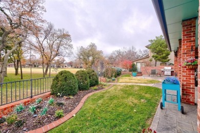 Lovely one level garden home with a view of the 12th fairway at on Oak Tree National Golf and Country Club in Oklahoma - for sale on GolfHomes.com, golf home, golf lot