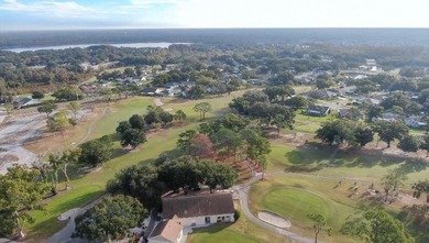 Completely renovated throughout!  This turnkey home is in one of on Highland Lakes Executive Golf Course in Florida - for sale on GolfHomes.com, golf home, golf lot