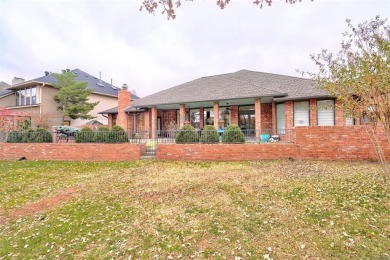 Lovely one level garden home with a view of the 12th fairway at on Oak Tree National Golf and Country Club in Oklahoma - for sale on GolfHomes.com, golf home, golf lot