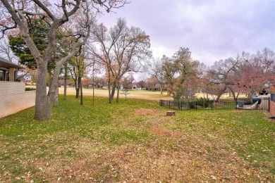 Lovely one level garden home with a view of the 12th fairway at on Oak Tree National Golf and Country Club in Oklahoma - for sale on GolfHomes.com, golf home, golf lot