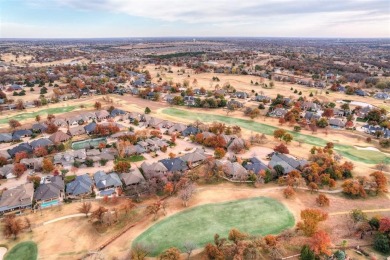 Lovely one level garden home with a view of the 12th fairway at on Oak Tree National Golf and Country Club in Oklahoma - for sale on GolfHomes.com, golf home, golf lot