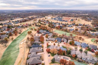 Lovely one level garden home with a view of the 12th fairway at on Oak Tree National Golf and Country Club in Oklahoma - for sale on GolfHomes.com, golf home, golf lot