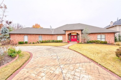 Lovely one level garden home with a view of the 12th fairway at on Oak Tree National Golf and Country Club in Oklahoma - for sale on GolfHomes.com, golf home, golf lot