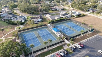 Completely renovated throughout!  This turnkey home is in one of on Highland Lakes Executive Golf Course in Florida - for sale on GolfHomes.com, golf home, golf lot