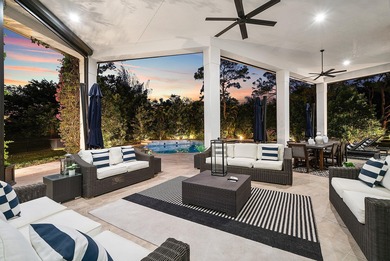 Nestled on 1.35 acres in the prestigious Sherbrooke Estates on Sherbrooke Golf and Country Club in Florida - for sale on GolfHomes.com, golf home, golf lot