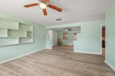 Welcome to this stunning, fully renovated 3-bedroom, 1.5-bath on Osceola Municipal Golf Course in Florida - for sale on GolfHomes.com, golf home, golf lot