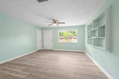 Welcome to this stunning, fully renovated 3-bedroom, 1.5-bath on Osceola Municipal Golf Course in Florida - for sale on GolfHomes.com, golf home, golf lot