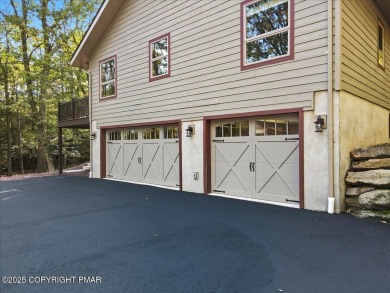 ''WHERE FOREST WHISPERS MEET MOUNTAIN MAGIC'' Tucked beneath a on Split Rock Resort and Country Club in Pennsylvania - for sale on GolfHomes.com, golf home, golf lot