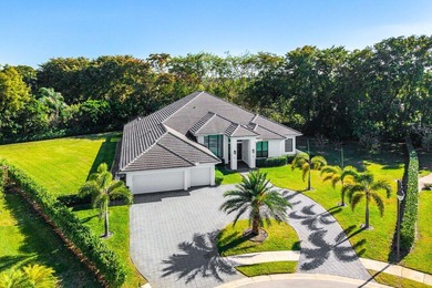 Welcome to an extraordinary, fully reimagined contemporary on Bocaire Country Club in Florida - for sale on GolfHomes.com, golf home, golf lot