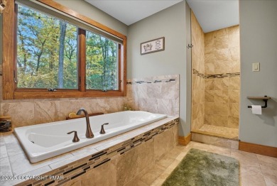 ''WHERE FOREST WHISPERS MEET MOUNTAIN MAGIC'' Tucked beneath a on Split Rock Resort and Country Club in Pennsylvania - for sale on GolfHomes.com, golf home, golf lot