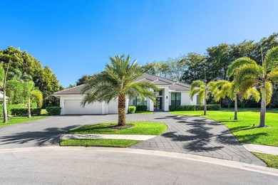 Welcome to an extraordinary, fully reimagined contemporary on Bocaire Country Club in Florida - for sale on GolfHomes.com, golf home, golf lot