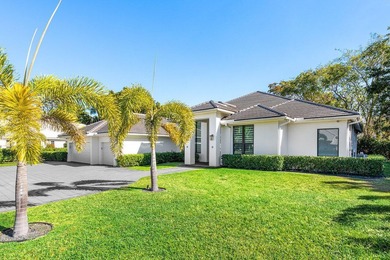 Welcome to an extraordinary, fully reimagined contemporary on Bocaire Country Club in Florida - for sale on GolfHomes.com, golf home, golf lot