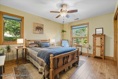 ''WHERE FOREST WHISPERS MEET MOUNTAIN MAGIC'' Tucked beneath a on Split Rock Resort and Country Club in Pennsylvania - for sale on GolfHomes.com, golf home, golf lot
