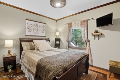 ''WHERE FOREST WHISPERS MEET MOUNTAIN MAGIC'' Tucked beneath a on Split Rock Resort and Country Club in Pennsylvania - for sale on GolfHomes.com, golf home, golf lot