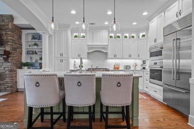 This stunning, turn-key, fully remodeled luxury townhome offers on Reynolds Lake Oconee - The Oconee in Georgia - for sale on GolfHomes.com, golf home, golf lot