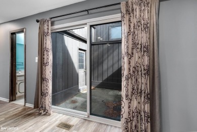 This beautifully maintained two-story condo features two on Plum Brook Golf Club in Michigan - for sale on GolfHomes.com, golf home, golf lot