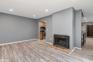 This beautifully maintained two-story condo features two on Plum Brook Golf Club in Michigan - for sale on GolfHomes.com, golf home, golf lot