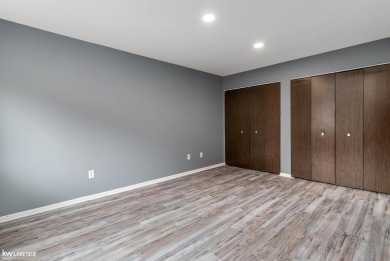 This beautifully maintained two-story condo features two on Plum Brook Golf Club in Michigan - for sale on GolfHomes.com, golf home, golf lot