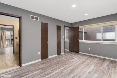 This beautifully maintained two-story condo features two on Plum Brook Golf Club in Michigan - for sale on GolfHomes.com, golf home, golf lot