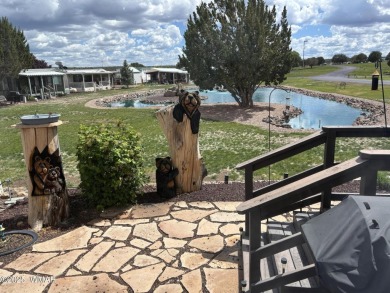 On one of the larger lots in Juniper Ridge Resort!! Beautiful on Juniper Ridge R.V. Golf Resort in Arizona - for sale on GolfHomes.com, golf home, golf lot