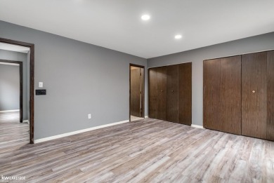 This beautifully maintained two-story condo features two on Plum Brook Golf Club in Michigan - for sale on GolfHomes.com, golf home, golf lot