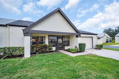 Welcome to this beautiful end-unit Sutton Place villa, offering on Highland Lakes Executive Golf Course in Florida - for sale on GolfHomes.com, golf home, golf lot