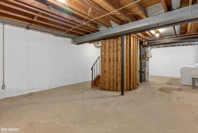 This beautifully maintained two-story condo features two on Plum Brook Golf Club in Michigan - for sale on GolfHomes.com, golf home, golf lot