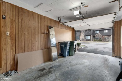 This beautifully maintained two-story condo features two on Plum Brook Golf Club in Michigan - for sale on GolfHomes.com, golf home, golf lot