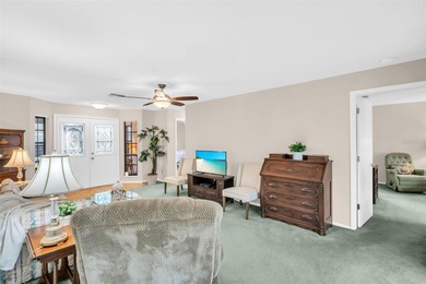 Welcome to this beautiful end-unit Sutton Place villa, offering on Highland Lakes Executive Golf Course in Florida - for sale on GolfHomes.com, golf home, golf lot