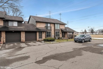 This beautifully maintained two-story condo features two on Plum Brook Golf Club in Michigan - for sale on GolfHomes.com, golf home, golf lot