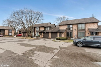 This beautifully maintained two-story condo features two on Plum Brook Golf Club in Michigan - for sale on GolfHomes.com, golf home, golf lot