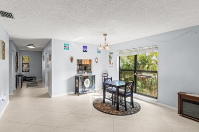 Beautifully maintained 2-bedroom, 2-bath corner unit featuring on Boca Lago Golf and Country Club in Florida - for sale on GolfHomes.com, golf home, golf lot