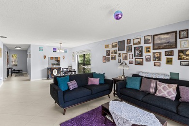 Beautifully maintained 2-bedroom, 2-bath corner unit featuring on Boca Lago Golf and Country Club in Florida - for sale on GolfHomes.com, golf home, golf lot