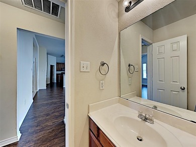 Discover the perfect blend of comfort and convenience in this on Mansfield National Golf Club in Texas - for sale on GolfHomes.com, golf home, golf lot