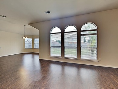 Discover the perfect blend of comfort and convenience in this on Mansfield National Golf Club in Texas - for sale on GolfHomes.com, golf home, golf lot