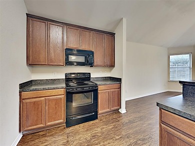 Discover the perfect blend of comfort and convenience in this on Mansfield National Golf Club in Texas - for sale on GolfHomes.com, golf home, golf lot