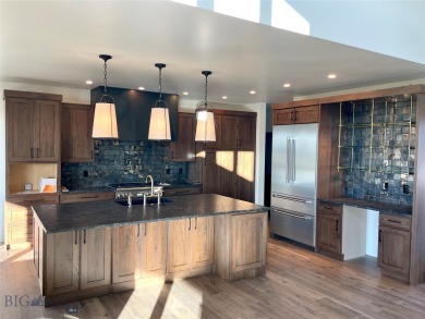 Located in the exclusive Black Bull Golf Community, this on Black Bull Golf Community in Montana - for sale on GolfHomes.com, golf home, golf lot