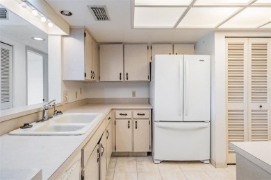 One or more photo(s) has been virtually staged. This one will on Carrollwood Country Club in Florida - for sale on GolfHomes.com, golf home, golf lot