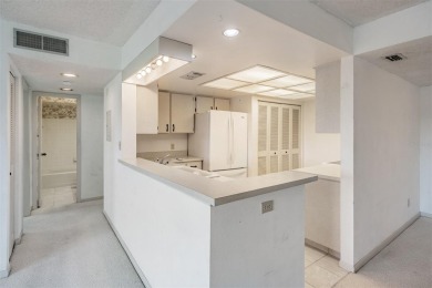 One or more photo(s) has been virtually staged. This one will on Carrollwood Country Club in Florida - for sale on GolfHomes.com, golf home, golf lot