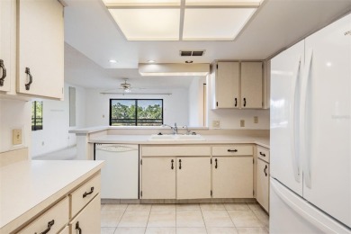 One or more photo(s) has been virtually staged. This one will on Carrollwood Country Club in Florida - for sale on GolfHomes.com, golf home, golf lot