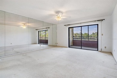 One or more photo(s) has been virtually staged. This one will on Carrollwood Country Club in Florida - for sale on GolfHomes.com, golf home, golf lot