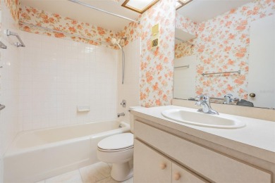 One or more photo(s) has been virtually staged. This one will on Carrollwood Country Club in Florida - for sale on GolfHomes.com, golf home, golf lot