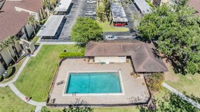 One or more photo(s) has been virtually staged. This one will on Carrollwood Country Club in Florida - for sale on GolfHomes.com, golf home, golf lot