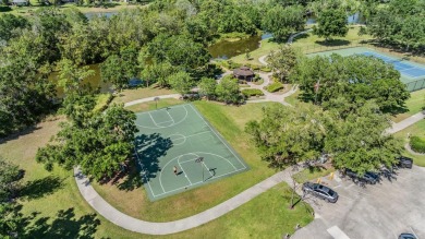 One or more photo(s) has been virtually staged. This one will on Carrollwood Country Club in Florida - for sale on GolfHomes.com, golf home, golf lot