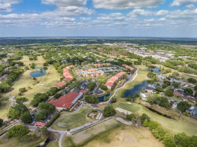 One or more photo(s) has been virtually staged. This one will on Carrollwood Country Club in Florida - for sale on GolfHomes.com, golf home, golf lot