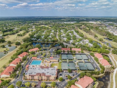 One or more photo(s) has been virtually staged. This one will on Carrollwood Country Club in Florida - for sale on GolfHomes.com, golf home, golf lot