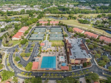 One or more photo(s) has been virtually staged. This one will on Carrollwood Country Club in Florida - for sale on GolfHomes.com, golf home, golf lot