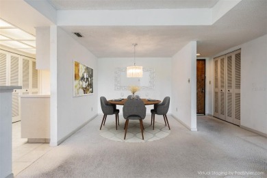 One or more photo(s) has been virtually staged. This one will on Carrollwood Country Club in Florida - for sale on GolfHomes.com, golf home, golf lot
